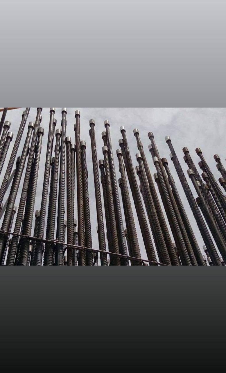 Threaded coupler and rebar